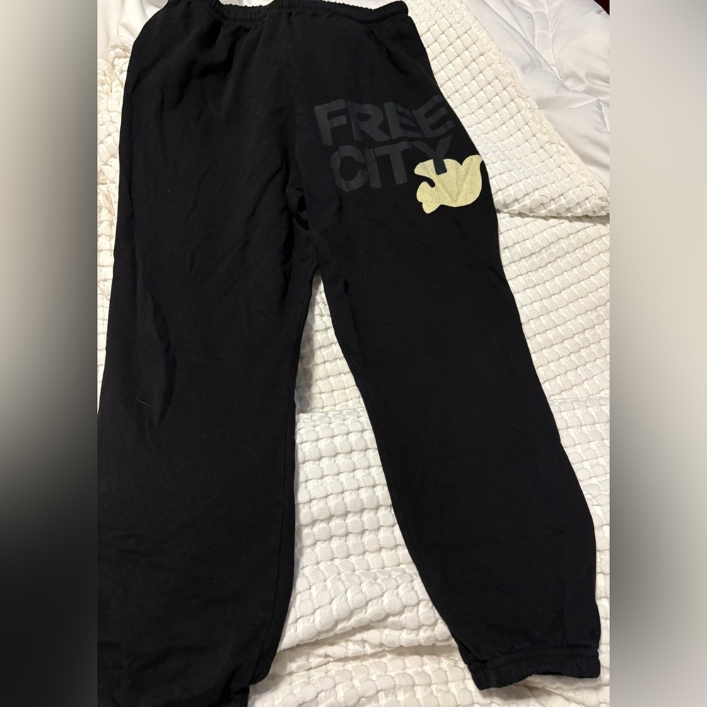 Freecity black sweatpants with yellow logo
